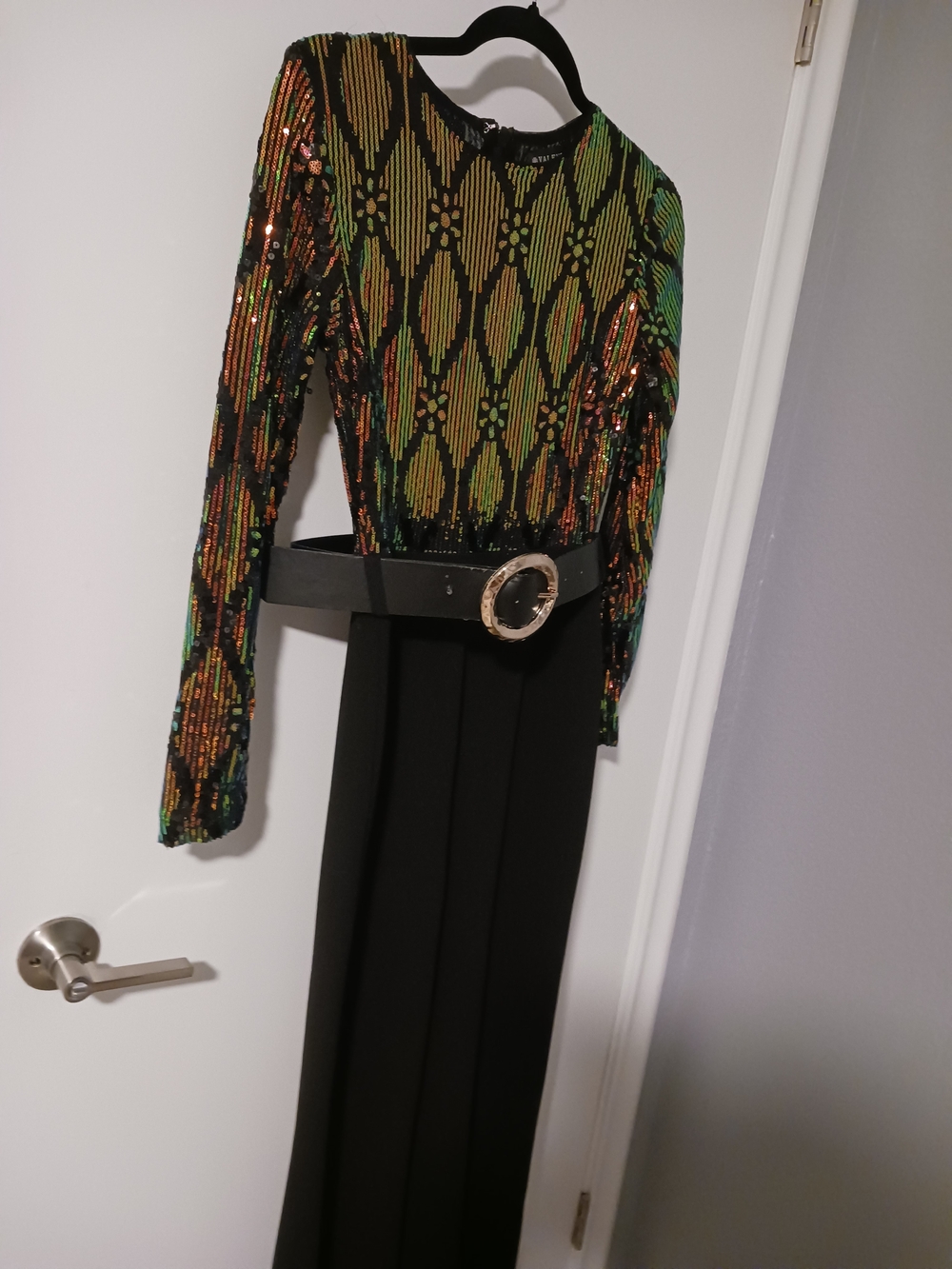 Black Jumpsuit with Green and Gold Sequin Top and Black Belt.